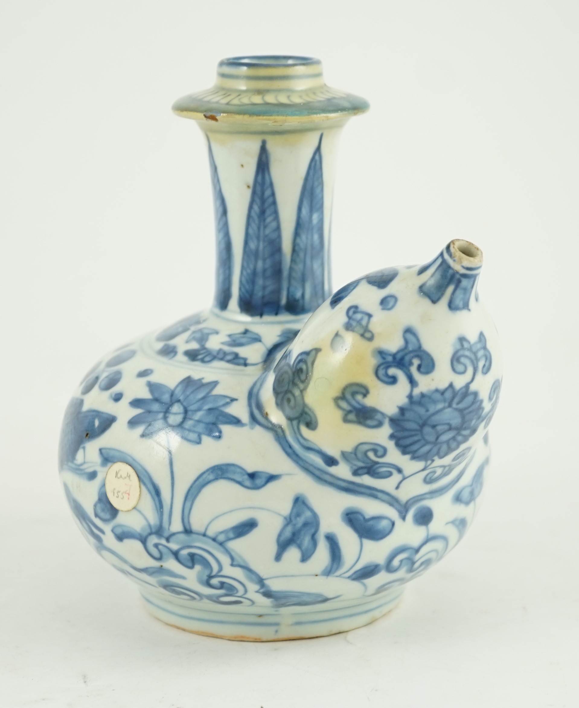 A Chinese late Ming blue and white ‘bird and lotus’ kendi, 16.5 cm high, areas of restoration